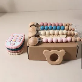 Подаръчна бебешка кутия 4 в 1 с дървени и силиконови артикули
