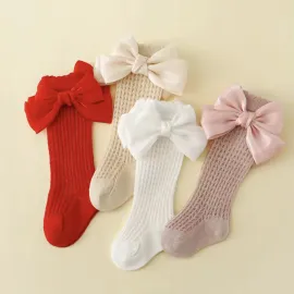Детски чорапи до коляното с голяма сатенена панделка