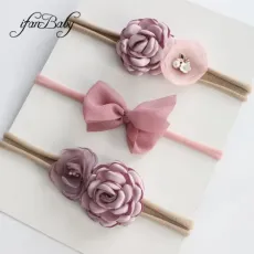 Комплект 3 бр бебешки ленти за глава в розово-лилави цветове