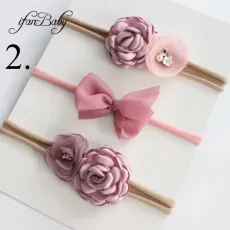 Комплект 3 бр бебешки ленти за глава в розово-лилави цветове