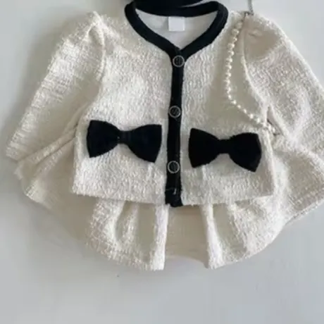 Детски елегантен комплект с бяла жилетка и пола White Lady Детски елегантен комплект с бяла жилетка и пола White Lady